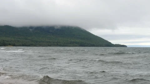 Restless waves of Lake Baikal on a windy summer day. Stock Footage 164425968