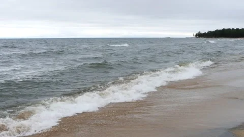 Restless waves of Lake Baikal on a windy summer day. Stock Footage 164426009