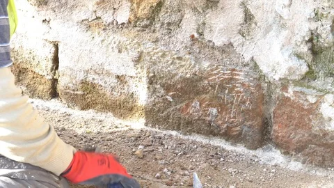 Restoration work in Temple for wall Stockbeeldmateriaal 85555948