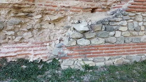 Restored and unrestored section of ancient Roman town wall Stock Footage 97206712