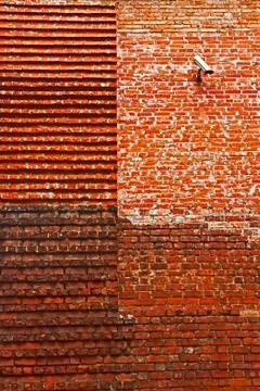 Restored medieval brick wall Stock Photos