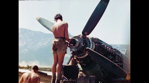 Restored WWII Ground Crew Working on Spitfire Propeller, Corsica 1944 Stock Footage 336844434