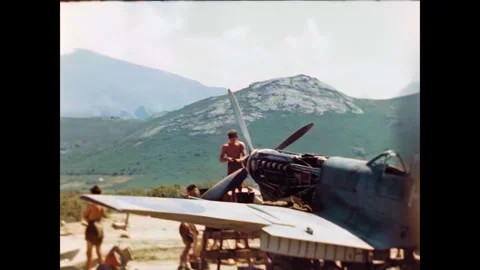 Restored WWII Ground Crews Servicing Spitfires, Corsica 1944 Stock Footage 336782755