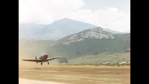 Restored WWII Pair of RAF Spitfires Taking Off From Dirt Runway, Corsica 1944 Stock Footage 336782516