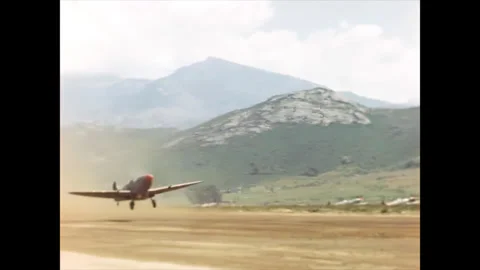 Restored WWII Pair of Spitfires Taking Off From Dirt Runway, Corsica 1944 60FPS Stock Footage 336781127