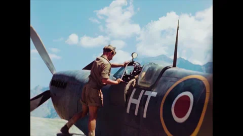 Restored WWII RAF Ground Crew Assisting Spitfire Pilot, Corsica 1944 Stock Footage 336782584