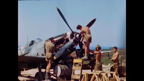 Restored WWII RAF Ground Crew Working on Spitfire Engine, Corsica 1944, 60FPS Stock Footage 336843665