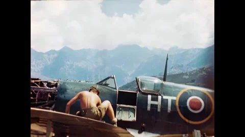 Restored WWII RAF Ground Crew Working on Spitfire Wing, Corsica 1944 Stock Footage 336845484