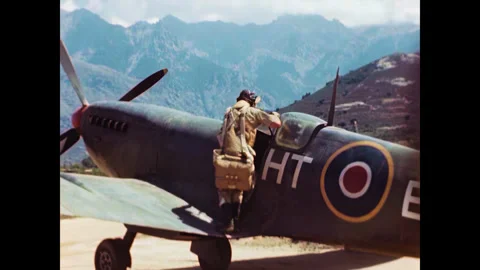 Restored WWII RAF Spitfire Pilot Entering Cockpit, Corsica 1944 60FPS Stock Footage 336781689