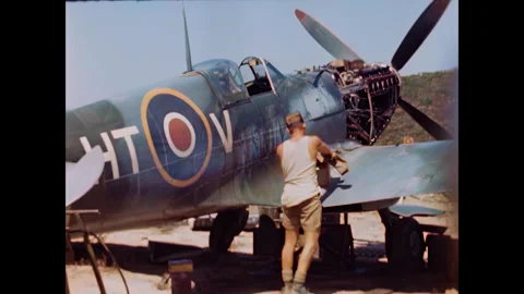 Restored WWII Spitfire Ground Crewman Taking a Break, Corsica 1944, 60FPS Stock Footage 336781271