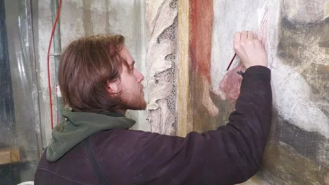 Restorer Working on Historic Baroque Wall Painting Stock-Footage 345255943