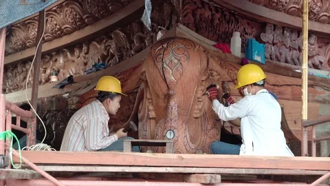 Restorers at work in the Sanctuary of Truth, Buddhist temple of Pattaya Stock-Footage 84298050