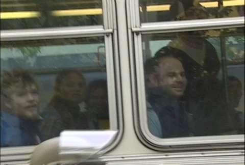Restrained Protester Through Bus Window at WTO Protests Stock Footage 106825585