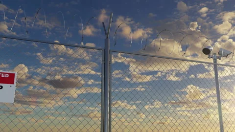 Restricted area and wire barbed fence at private forbidden zone loopable Stock Footage 151864600