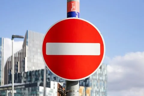 Restricted area marked by no entry street sign Stock Photos