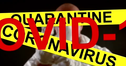 Restricted area. Yellow tape warning of quarantine and coronaves. In the Stock Footage 143686540