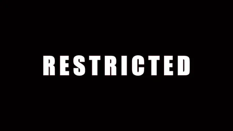 Restricted text appearing with cinematic motion on black background during .. Video stock 343478880