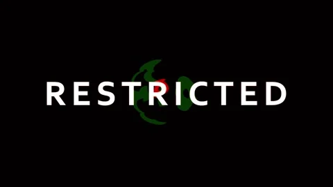 Restricted text appears with glitch and digital effects in a dark cinematic.. Stock Footage 343478911