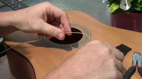 Restringing Guitar in Sunlight Видео 12612814