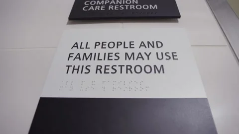 Restroom sign, bottom-up view Stock Footage 314967648