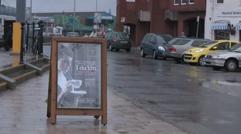 Resturant sign in the rain Stock Footage 7631608