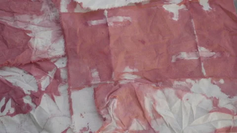 Result of tie dye technique applied to raw fabrics Stock Footage 141554463