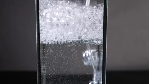 The results of the children's experiments were to put water in a glass, mix w Stock Footage 168519055