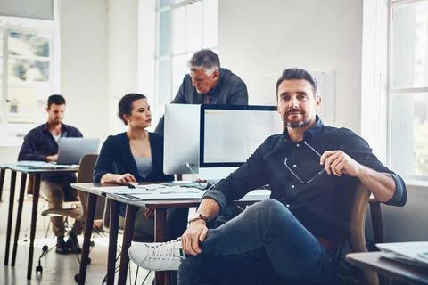 Results oriented and focused. Portrait of mature businessman using a computer at 스톡 사진