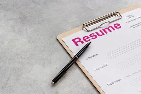 Resume application form on office table. Find new job concept Stock Photos