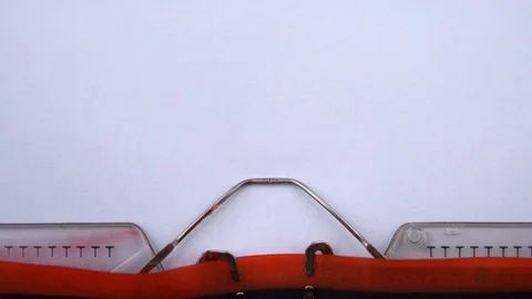 Resume- word printed on an old typewriter in red letters, close up. Stock Footage 126777511