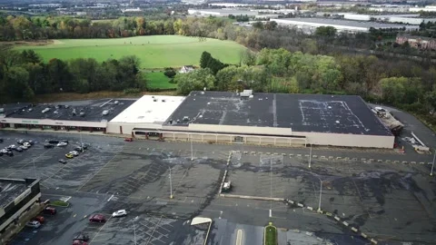 Retail Apocolypse: Aerial of abanodoned Kmart in a failed mall Stock Footage