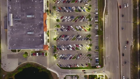Retail complex parking lot with heavy traffic, emphasizing large-scale Stock-Footage 333700534