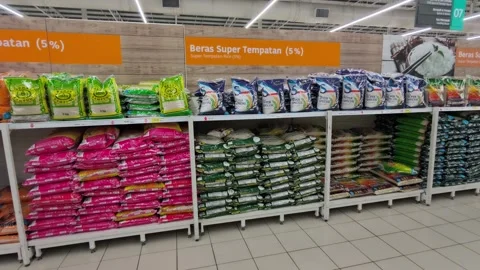 Retail Display of Packaged Rice Varieties Stock Footage 320558895