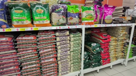 Retail Display of Packaged Rice Varieties Stock Footage 320559096