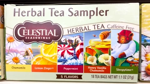 Retail grocery store Celestial herbal tea in a box on a shelf Stock Footage 203963340