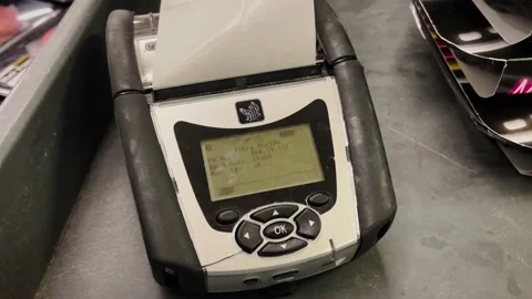 Retail grocery store a price printer Zebra Labeler printing out a managers sp Video stock 201498144