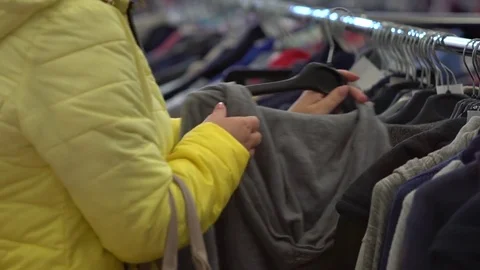 Retail store, clothes checking Stock Footage 80735234