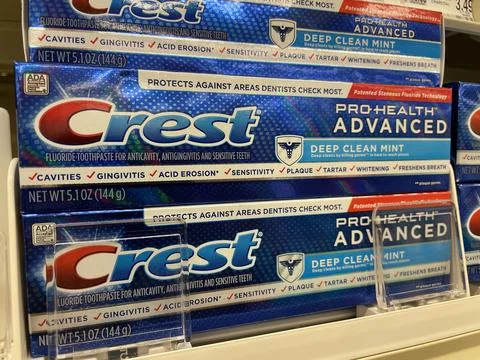 Retail store Crest toothpaste close up Stock Photos