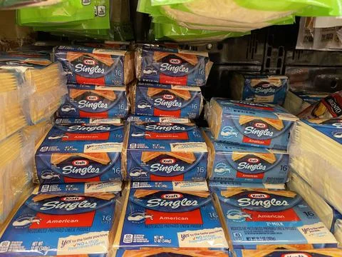Retail store Kraft cheese rows of single slice Stock Photos