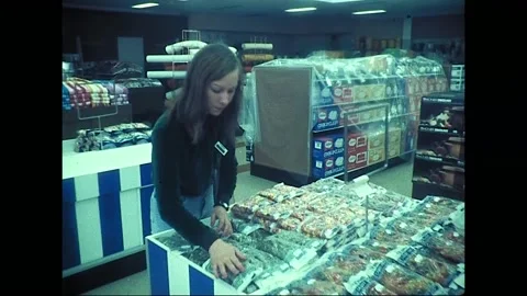 Retail Worker Restocks Variety Store Shelves, Australia, 1976 Vídeo Stock 339308479
