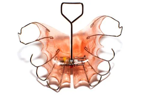 Retainer for teeth. Teeth alignment plate. Dental treatment. Tooth plates Stock Photos