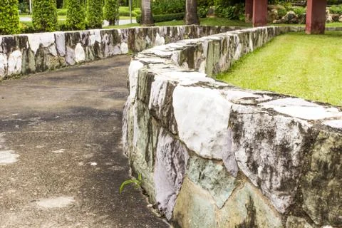 Retaining wall  in garden. Stock Photos
