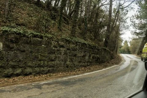 Retaining wall made of stone. Stock Photos