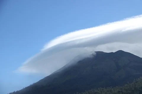 Reticular cloud phenomenon over Mount Arjuno Stock Photos