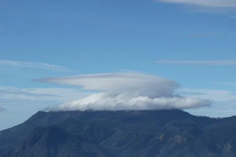 Reticular cloud phenomenon over Mount Arjuno Stock Photos