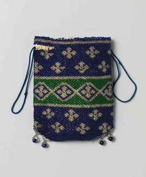 Reticule in a flat rectangular model, whole of blue, green and white beads... 库存照片