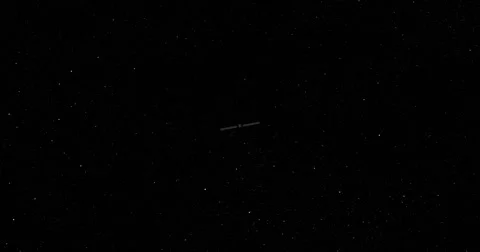 Retimed, matrix-style flyby of Dawn spacecraft travelling through space Stock Footage 58997353