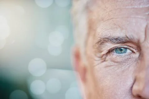 Retina, vision and mockup with blue eye of old man for focus, optometry and Stock Photos
