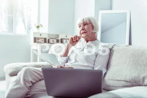 Retired artist feeling thoughtful having no ideas about new painting Stock Photos