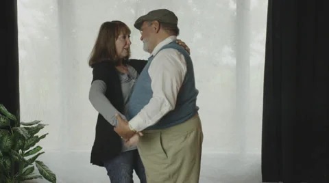 Retired Couple Dancing at Home Stock Footage 35326745